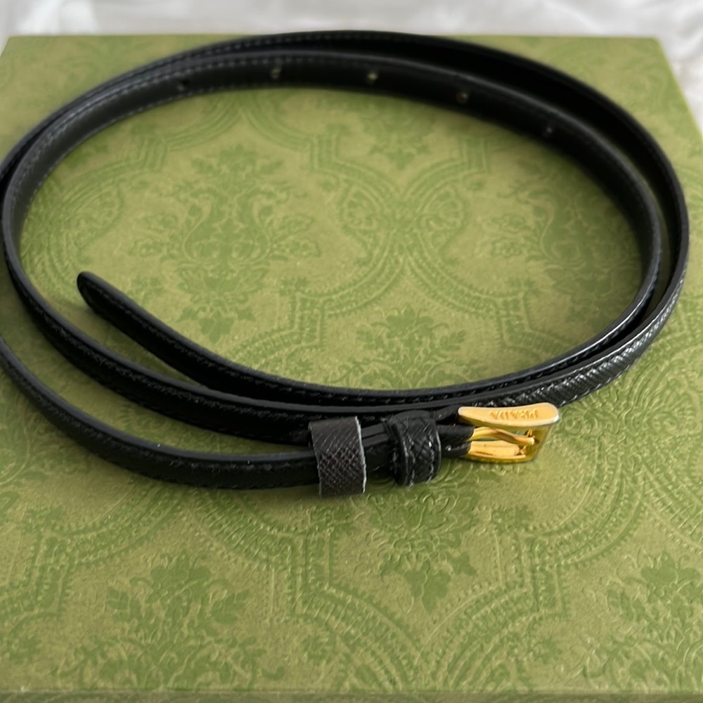 Prada skinny leather belt.